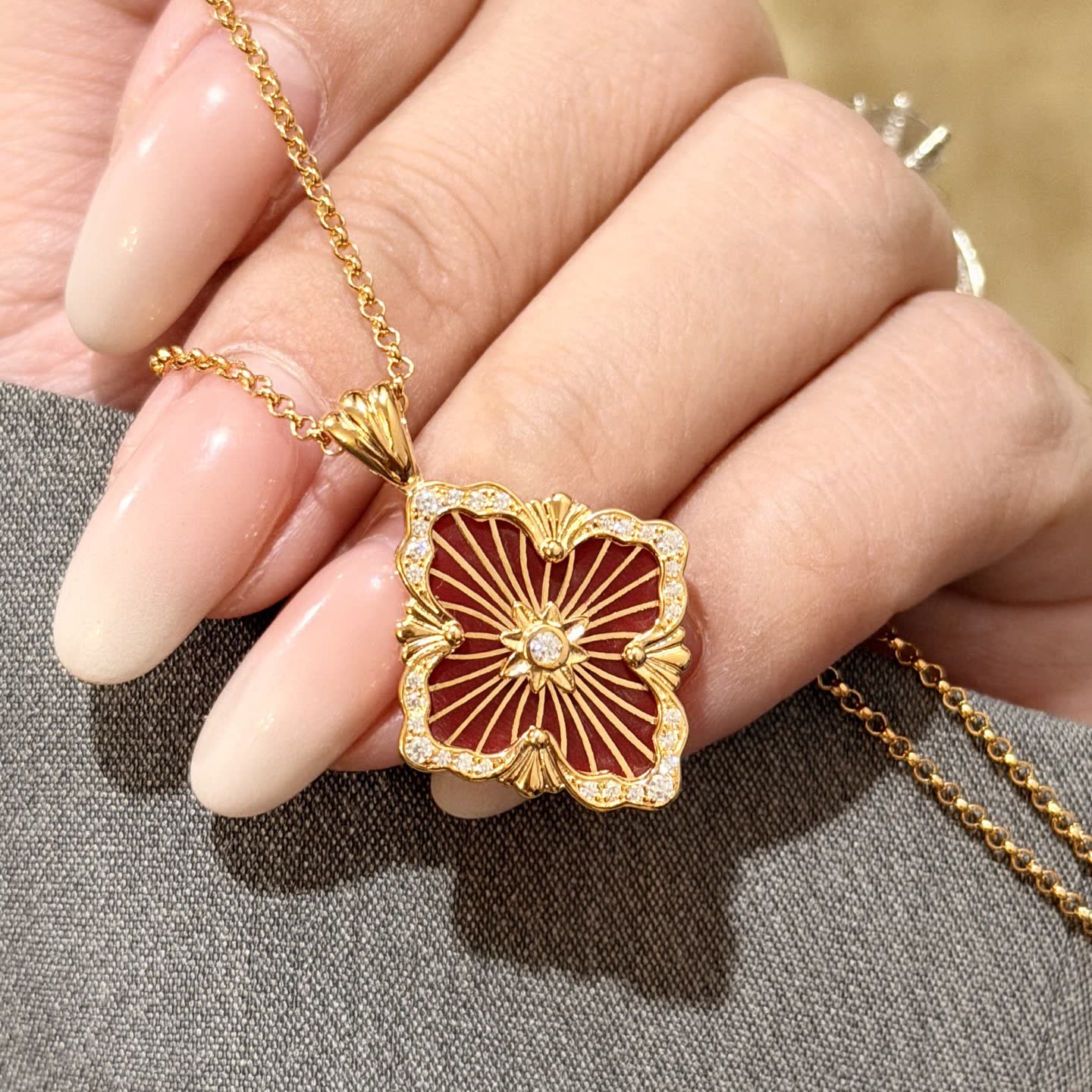 Van Cleef & Arpels Elegant Gold and Red Enamel Flower Pendant Necklace